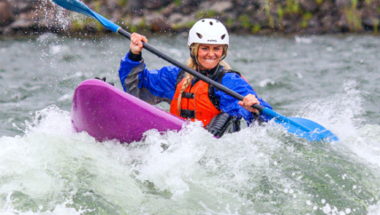 image of lady kayaking in gardiner mt